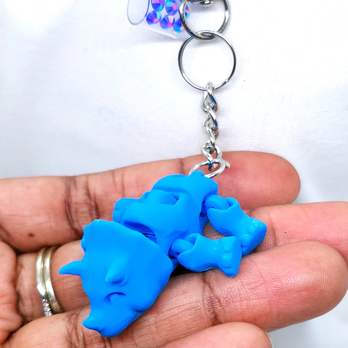 Blue Triceratops: Fun and Functional Badge Reel Accessory
