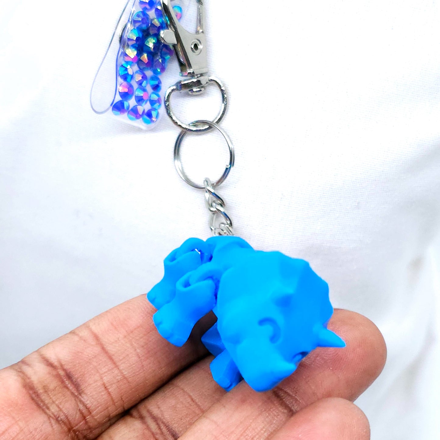 Blue Triceratops: Fun and Functional Badge Reel Accessory