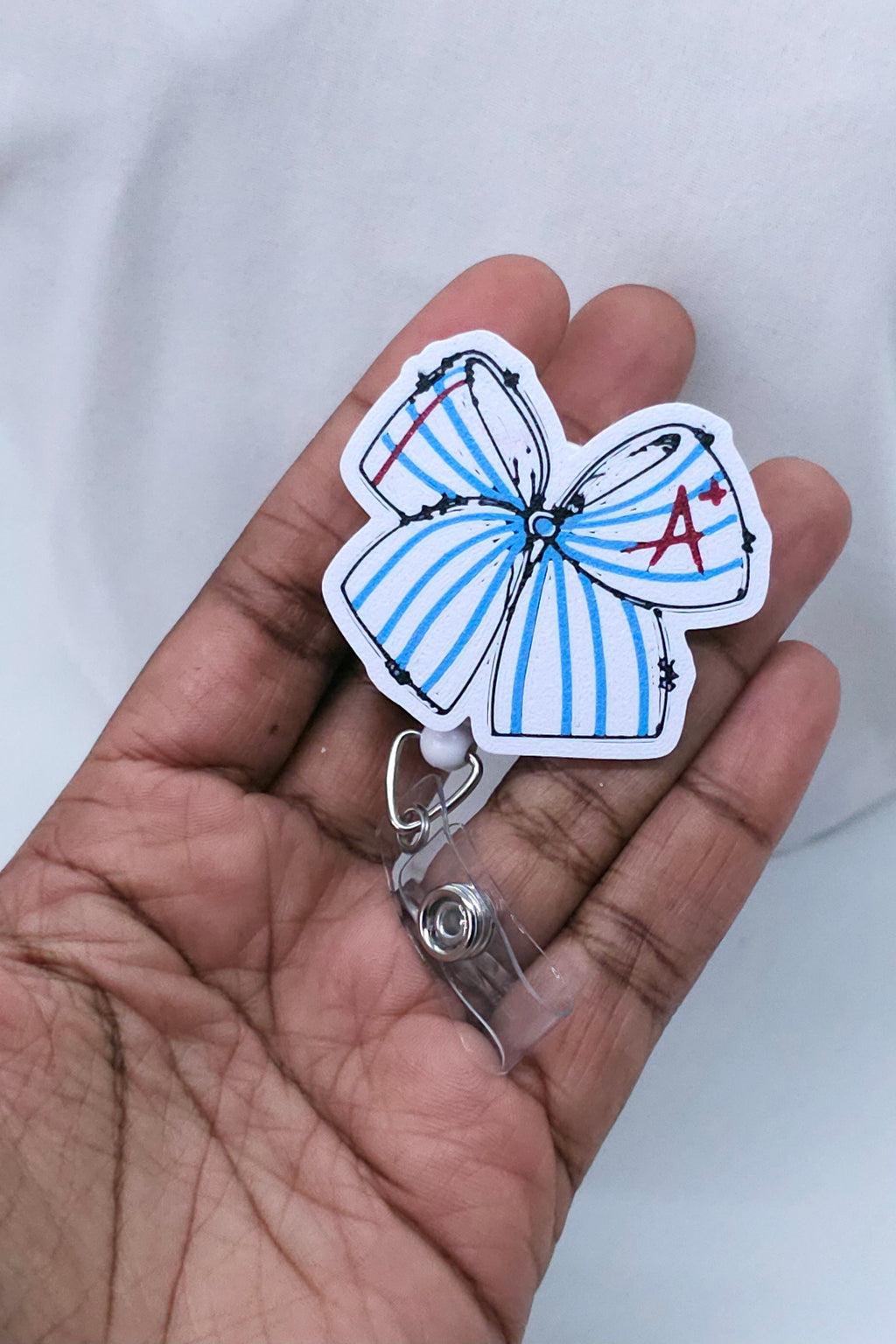 A+ Blue Stripe Bow Badge Reel – Cute Teacher & School Nurse Badge Holder